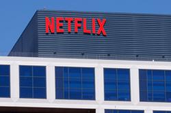 Netflix raises prices and adds subscribers, despite strikes