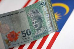 Ringgit ends weaker against US dollar